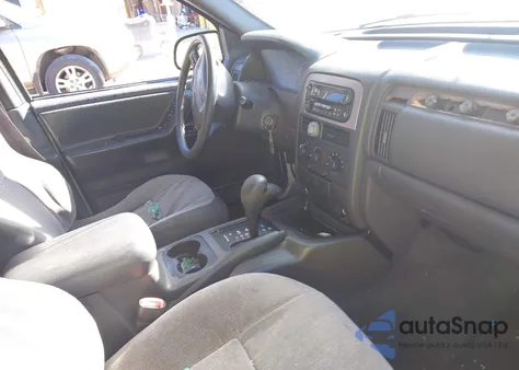 2001 Jeep Grand Cherokee Laredo z USA, uszkodzony, nr VIN 1J4GW48S81C520385